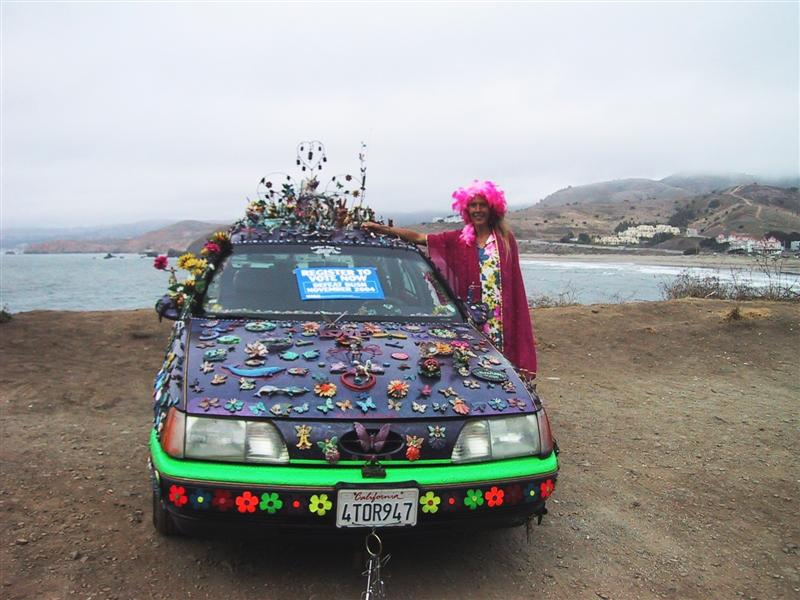 Illustration for article titled Groovalicious Purple Princess Of Peace Art Car Falls On Hard Times, Faces Crusher